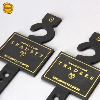 Feuille d'or emboutissant les cintres en plastique de ceinture de logo pour le placard